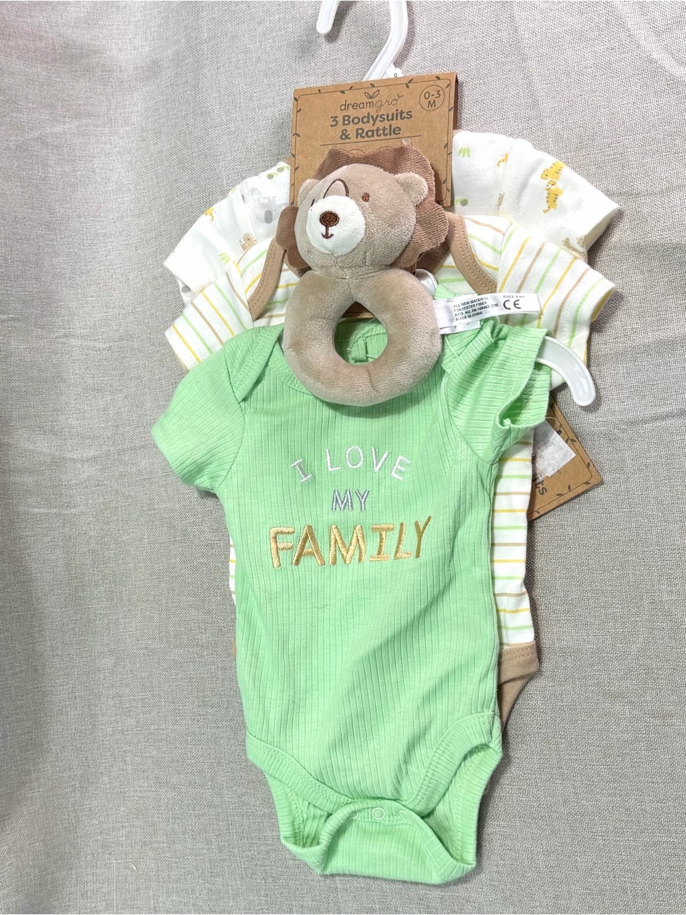 Dreamgro 3 Pack Baby One-Piece Set featuring a lion rattle